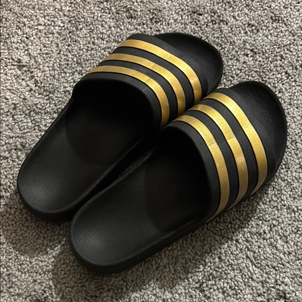 adidas Black Slide Sandals with Metallic Gold Stripes